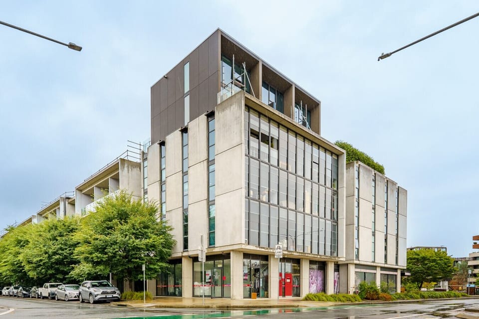 The property is located in a modern building, featuring contemporary design and stylish architecture.