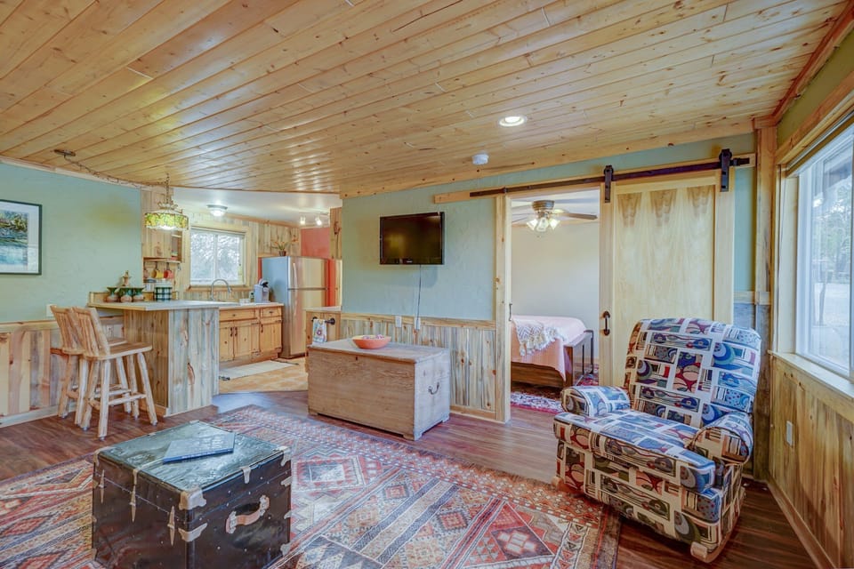 Kitchen is in the back, and bedroom is in the front