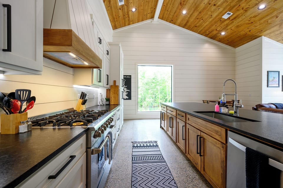 Spacious modern kitchen with rustic charm and stunning natural light.
