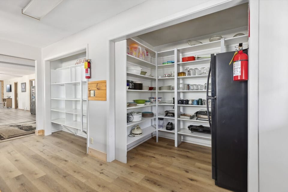 Kitchen Includes two Refrigerators and two Freezers