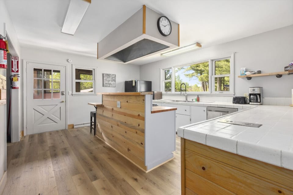 Kitchen Includes two Refrigerators and two Freezers