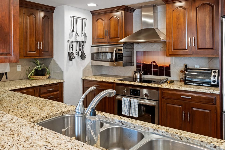 Fully Stocked Kitchen with Granite Countertops and New Appliances