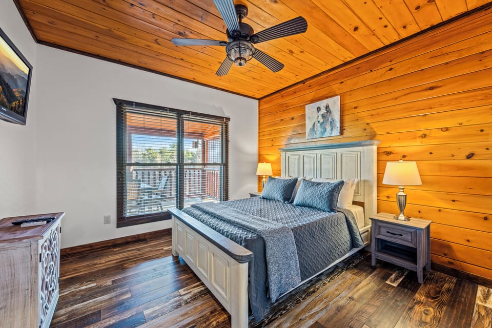 Main Floor Bedroom with Smart TV, walk-in closet and luggage racks