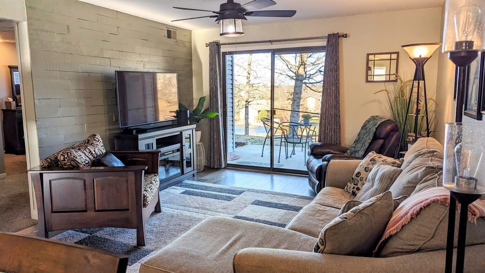Living area with access to back patio