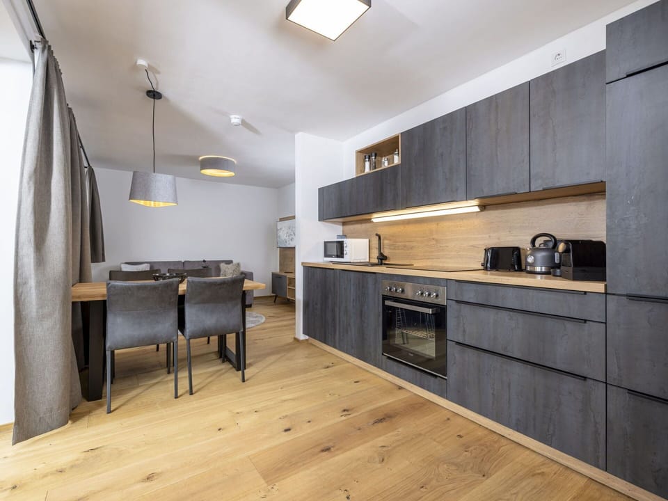 Cabinetry, Furniture, Property, Countertop, Wood, Kitchen Stove, Interior Design, Flooring, Kitchen, Floor