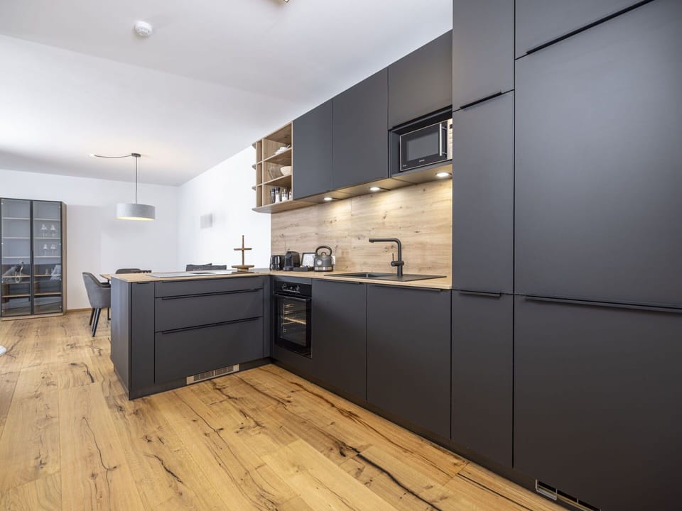 Countertop, Cabinetry, Property, Furniture, Drawer, Kitchen Stove, Kitchen, Tap, Wood, Building