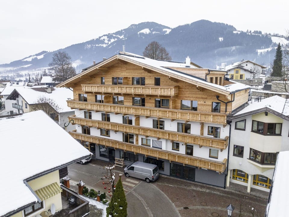 Sky, Building, Snow, Mountain, Window, Car, House, Urban Design, Residential Area, Neighbourhood