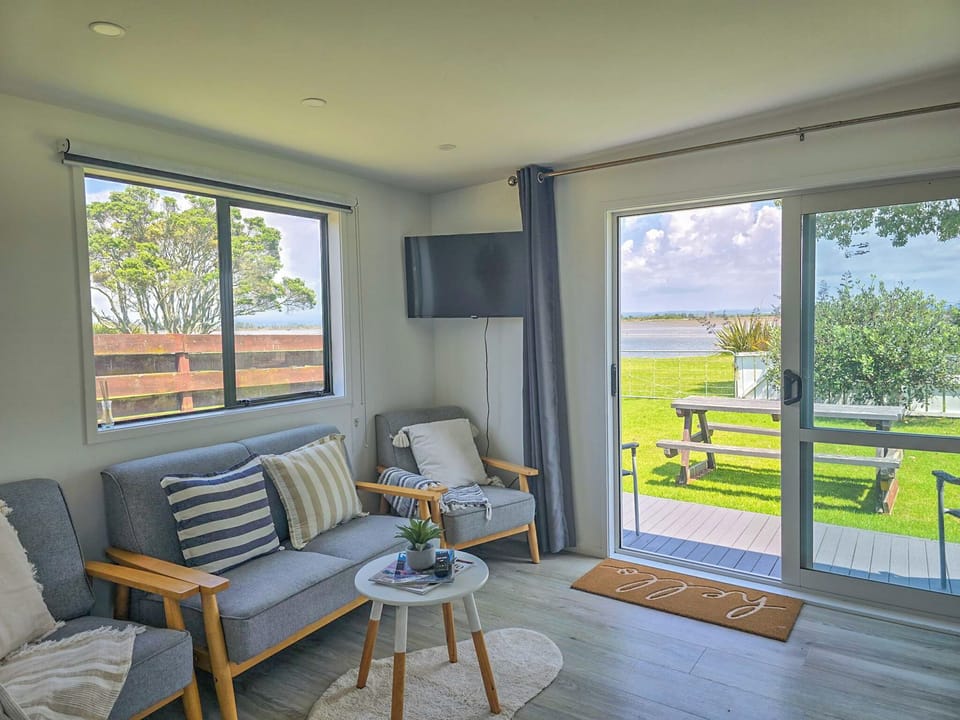 Living area flows out onto the outdoor deck area