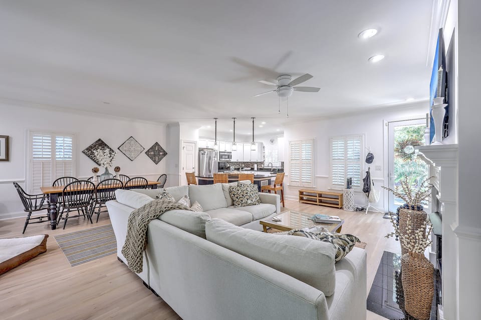 Our large dining table seats 6, with 4 counter stools nearby, offering ample seating for 10. Perfect for large family gatherings.