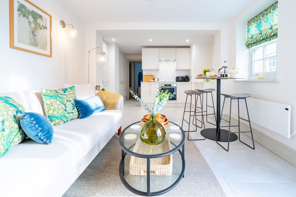 Ground Floor: A cosy sitting room, perfectly positioned next to the open-plan kitchen and dining area