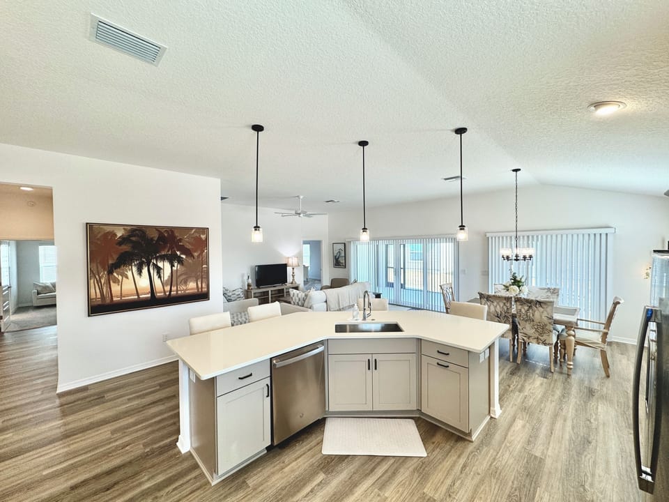 Coming out of Guest Quarters to Open Concept Common Area