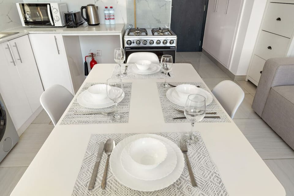 Dining Area: Enjoy delightful meals in this stylish, well-equipped space with modern flair!