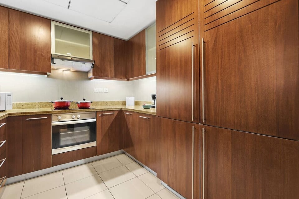 Full kitchen with ample storage and cooking space.