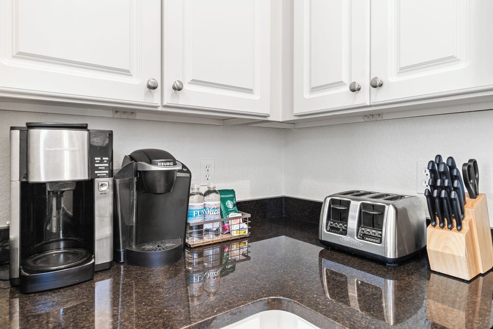 Start your mornings right with premium coffee and tea facilities, plus a toaster for fresh breakfast treats in your elegant kitchen.