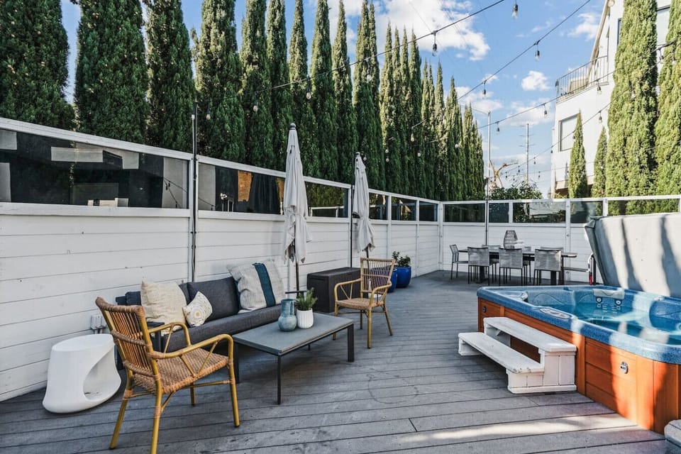Hot tub and outdoor seating area with plenty of seating options