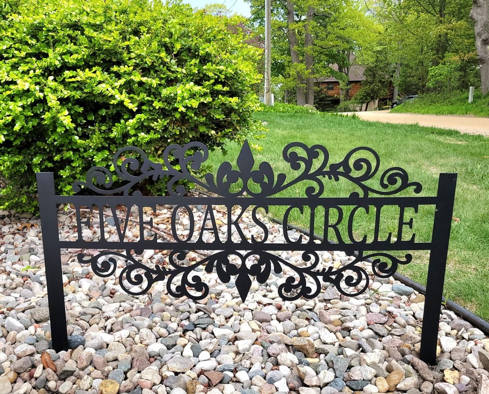 Sign Indicating name of house.