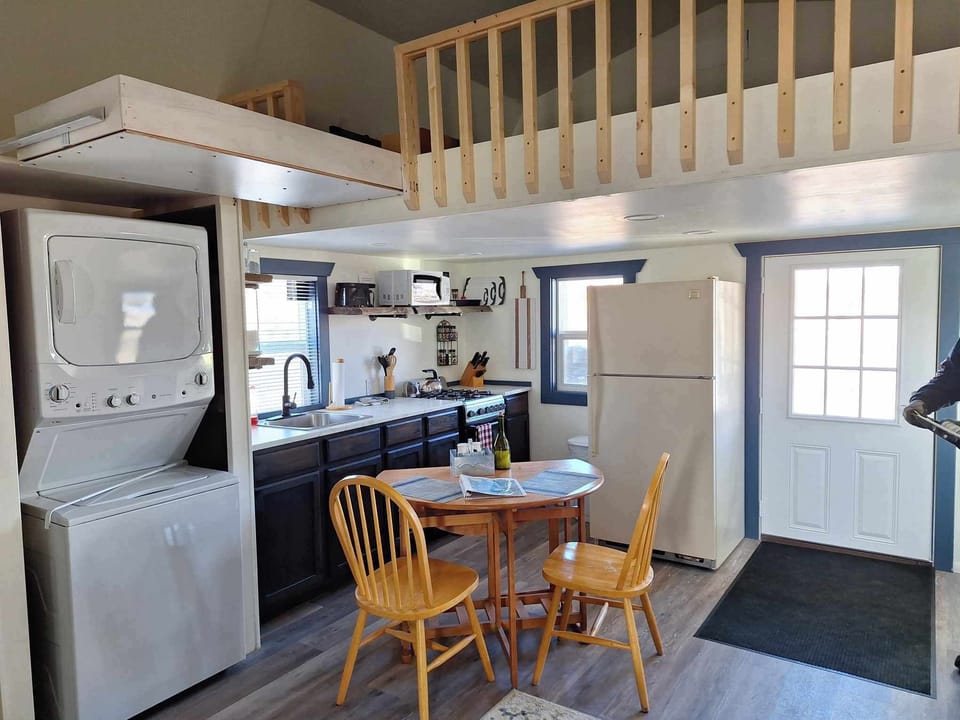 Loft space is accessible via pull down ladder.