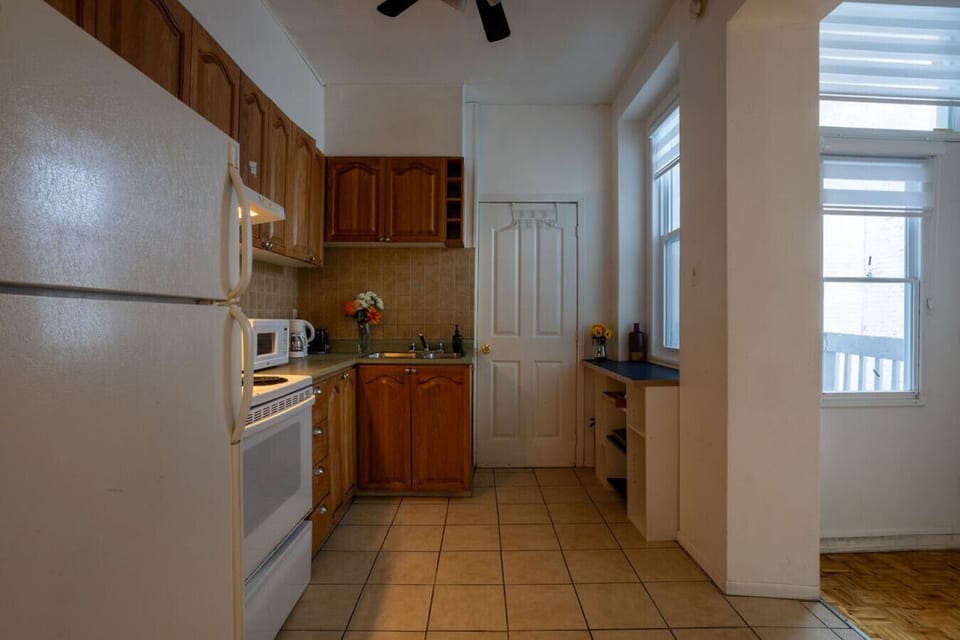 Bright kitchen with full-size appliances and ample cabinetry