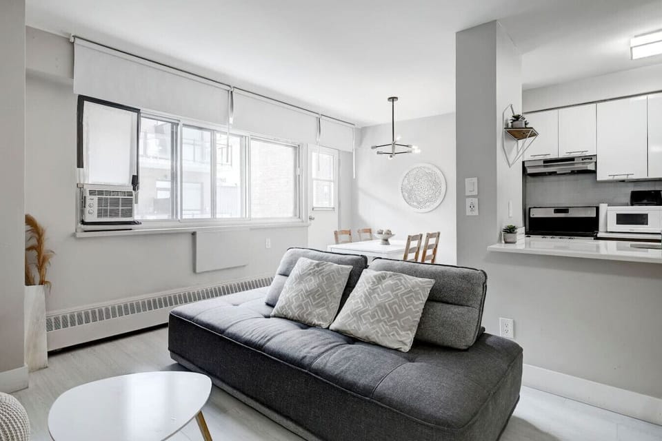 This bright and modern living space is perfect for unwinding after a day exploring Montreal.