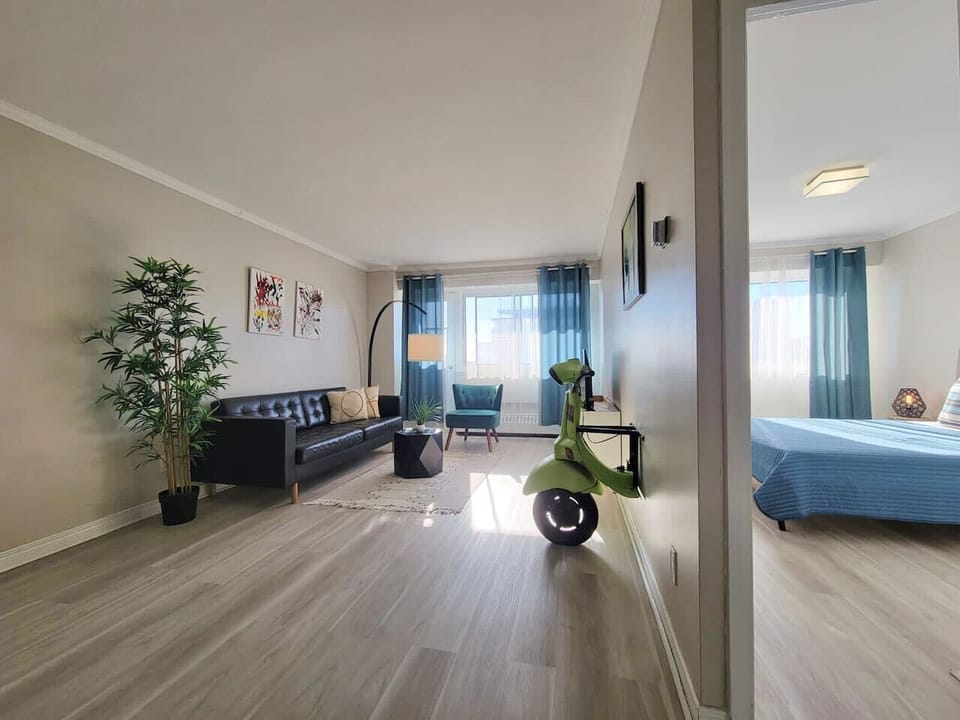 A unique perspective showcasing the expansive layout of the living area, blending comfort and modern aesthetics.