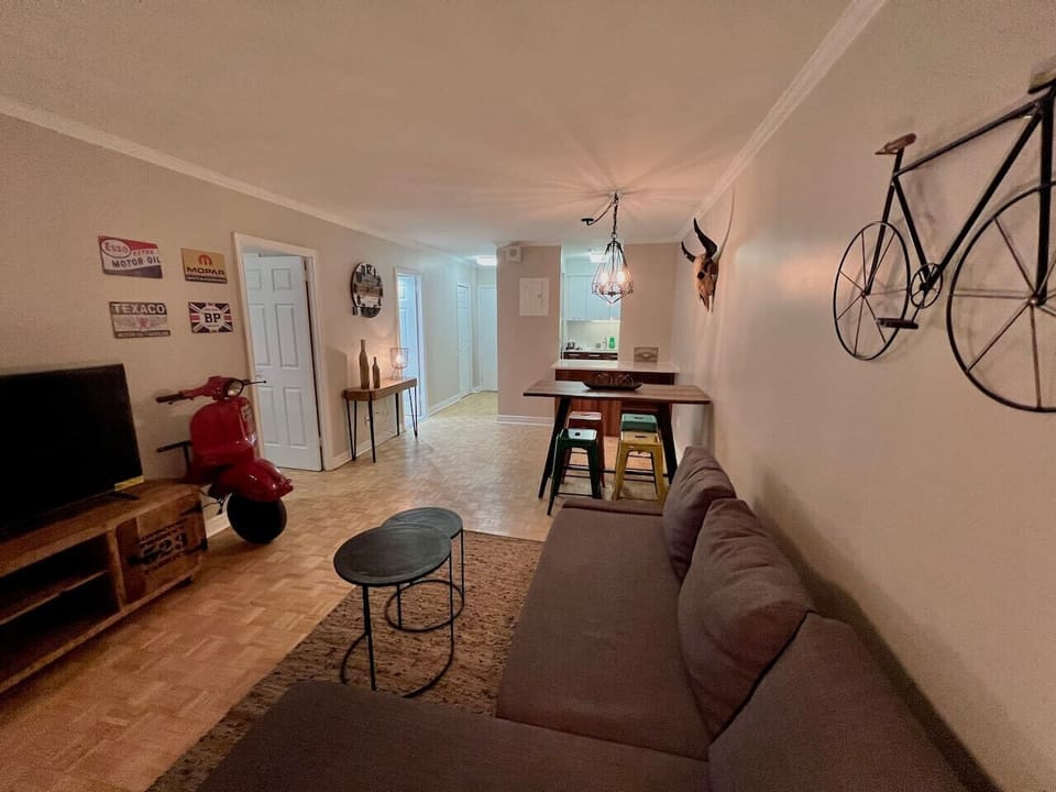 Another perspective of the living area, highlighting the sleek entertainment setup.