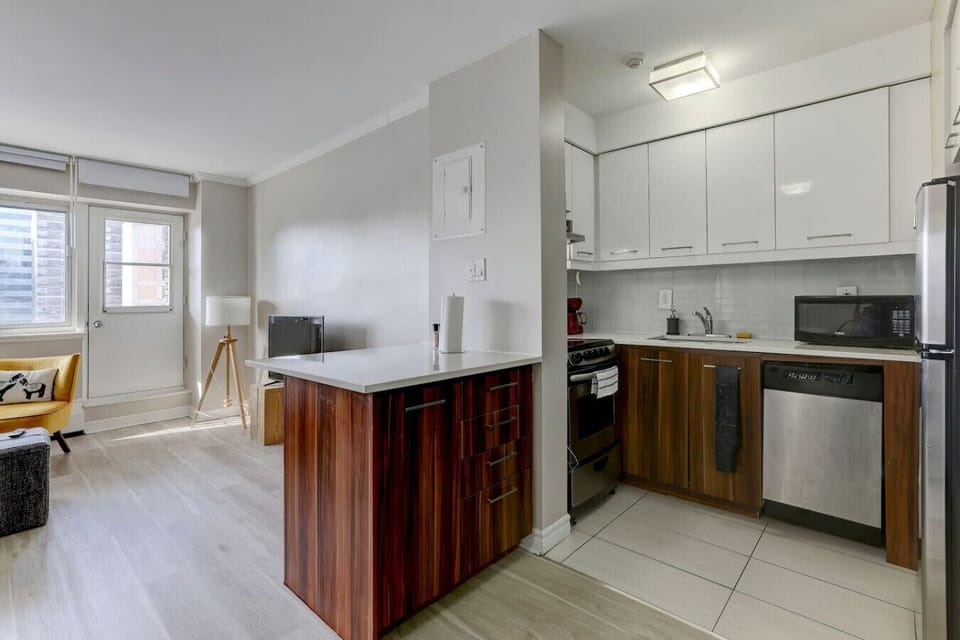 An inviting culinary space blending style and function, featuring ample counter space and natural light.
