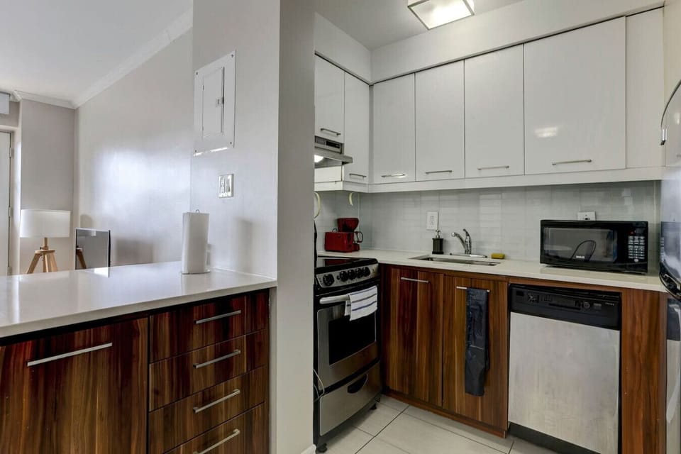 A closer look at the well-equipped kitchen, designed for effortless cooking and dining.
