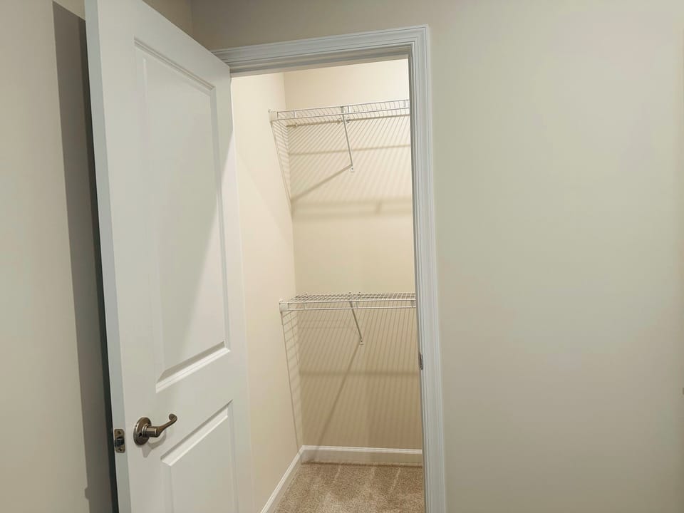 Walk-in closet in bedroom