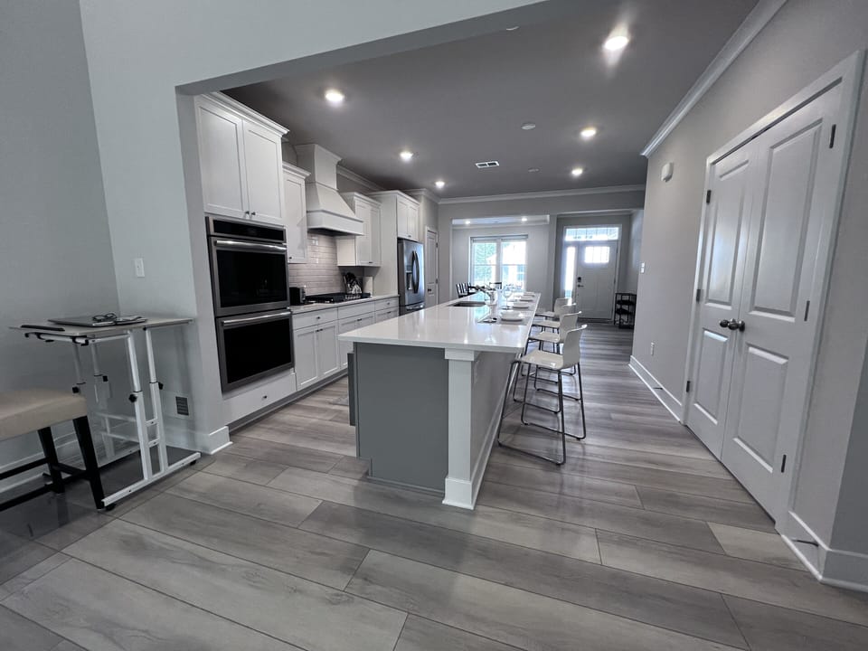 Chef’s Kitchen:  fully stocked with high-end appliances.
