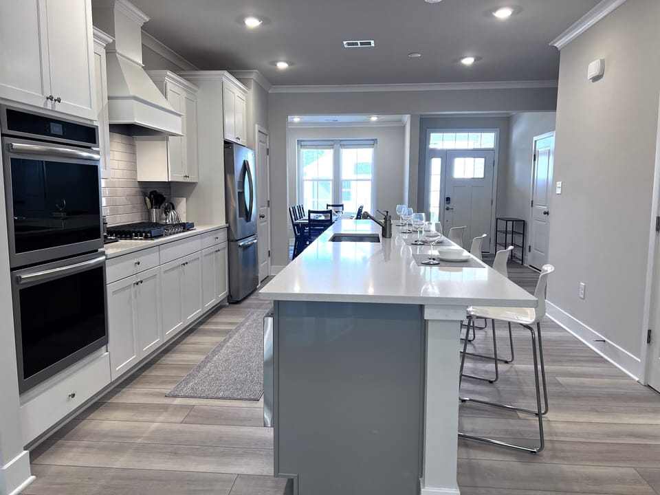 Stunning 15-foot white quartz island — perfect for entertaining.