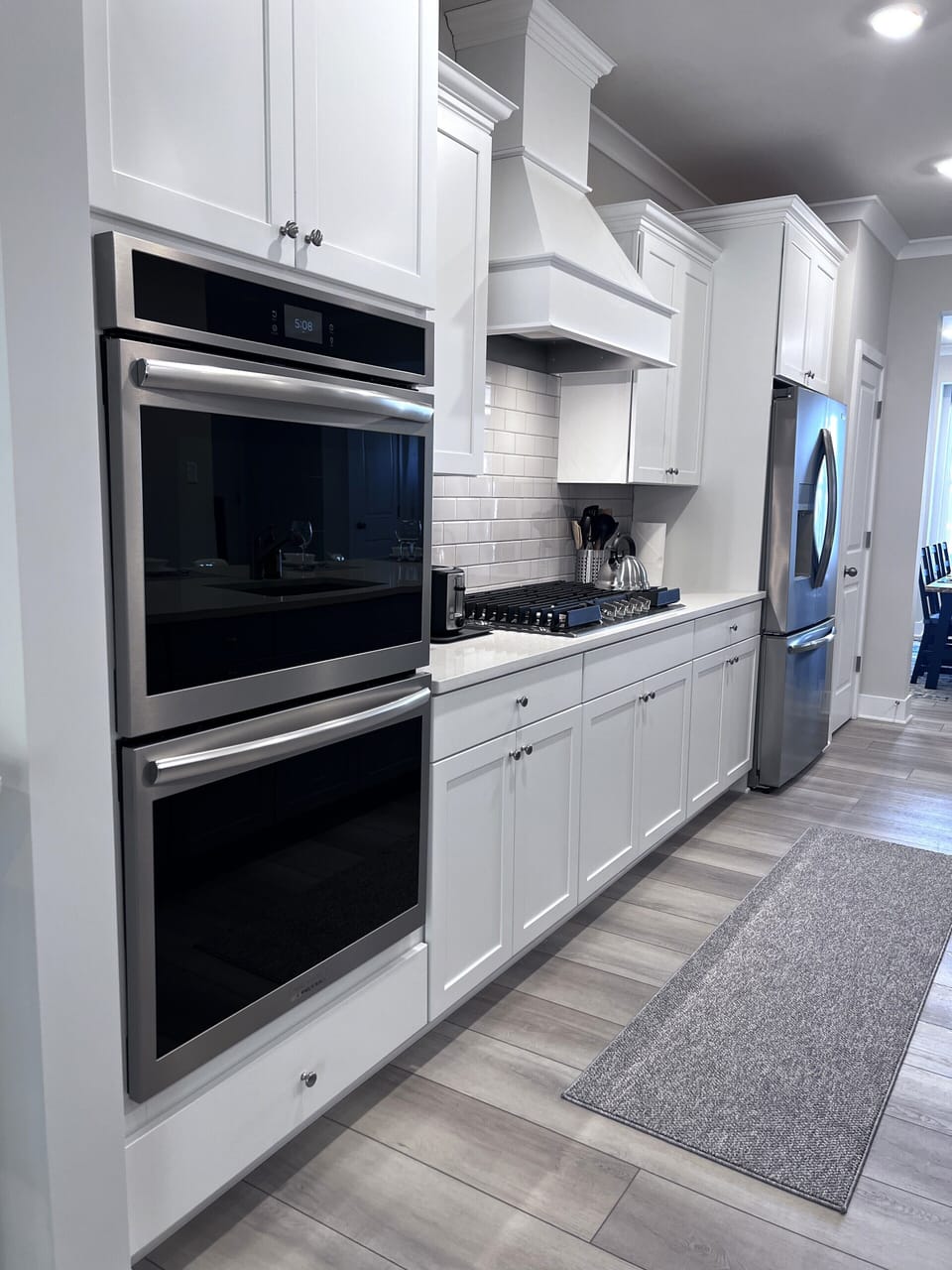 Chef’s Kitchen:  fully stocked with high-end appliances.