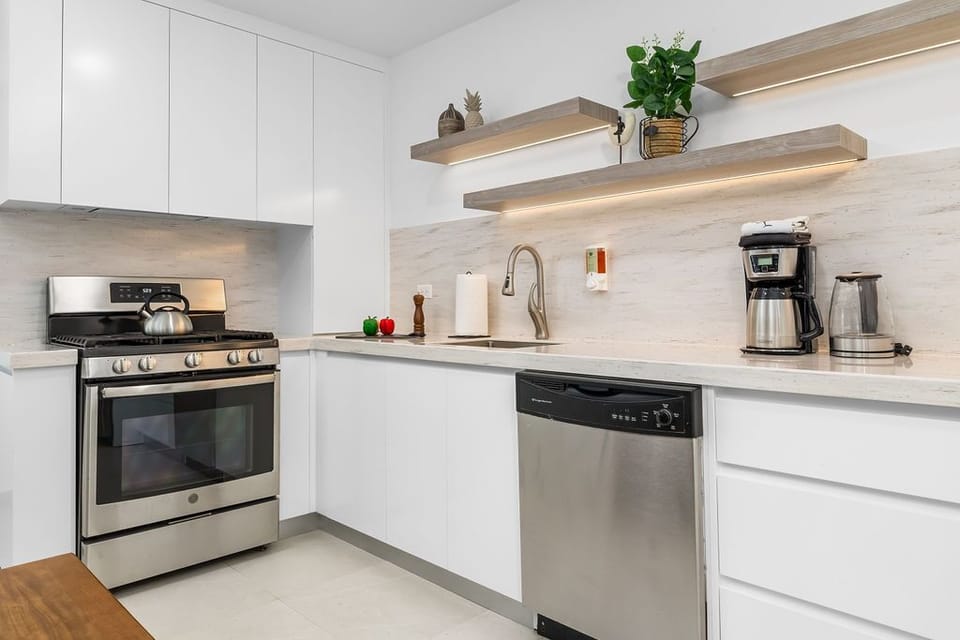 Prepare your favorite dishes with ease using the well-equipped kitchen, complete with premium appliances and stylish finishes.