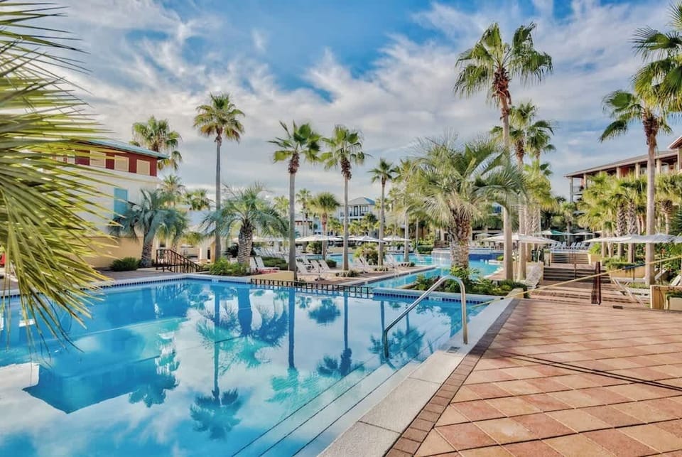 Refresh, relax, and recharge — this massive lagoon pool is the perfect family‑friendly hangout.