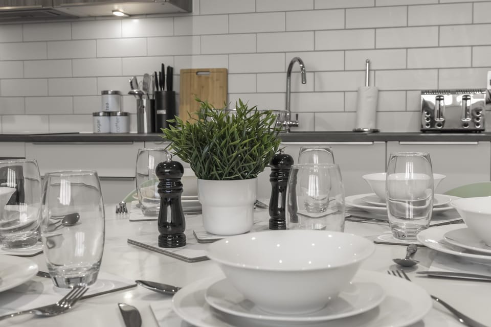 Compact dining area set for guests, ideal for meals or work