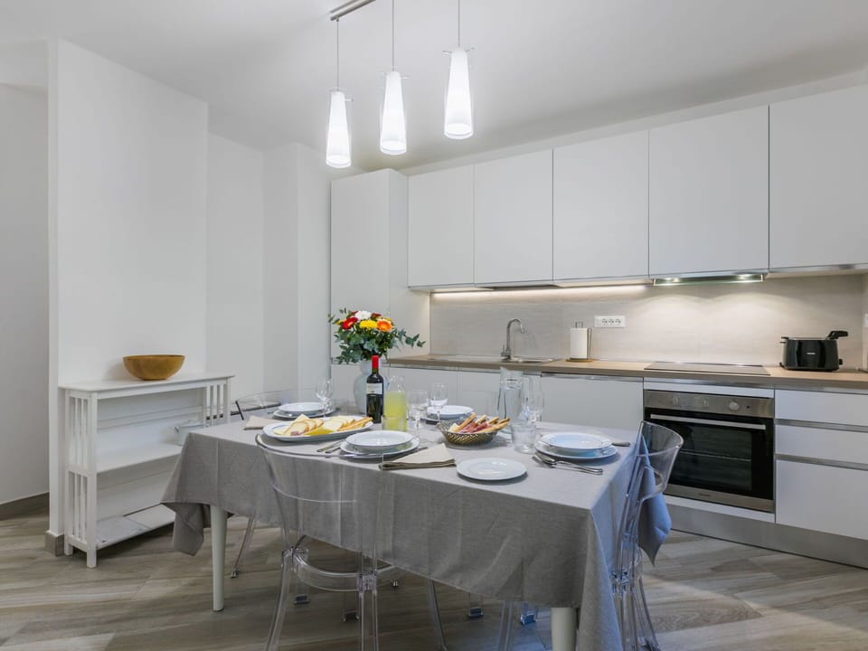 Furniture, Interior Design, Flooring, Wood, Kitchen, Kitchen Appliance, Ceiling, Floor, Major Appliance, Countertop