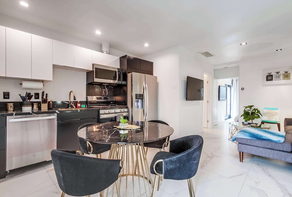 Recessed lighting throughout on a dimmer. Kitchen table