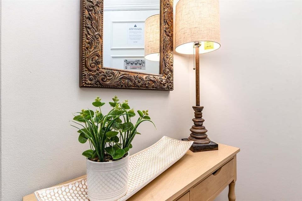 A simple console table near the entry gives a natural place to drop keys or a beach bag.