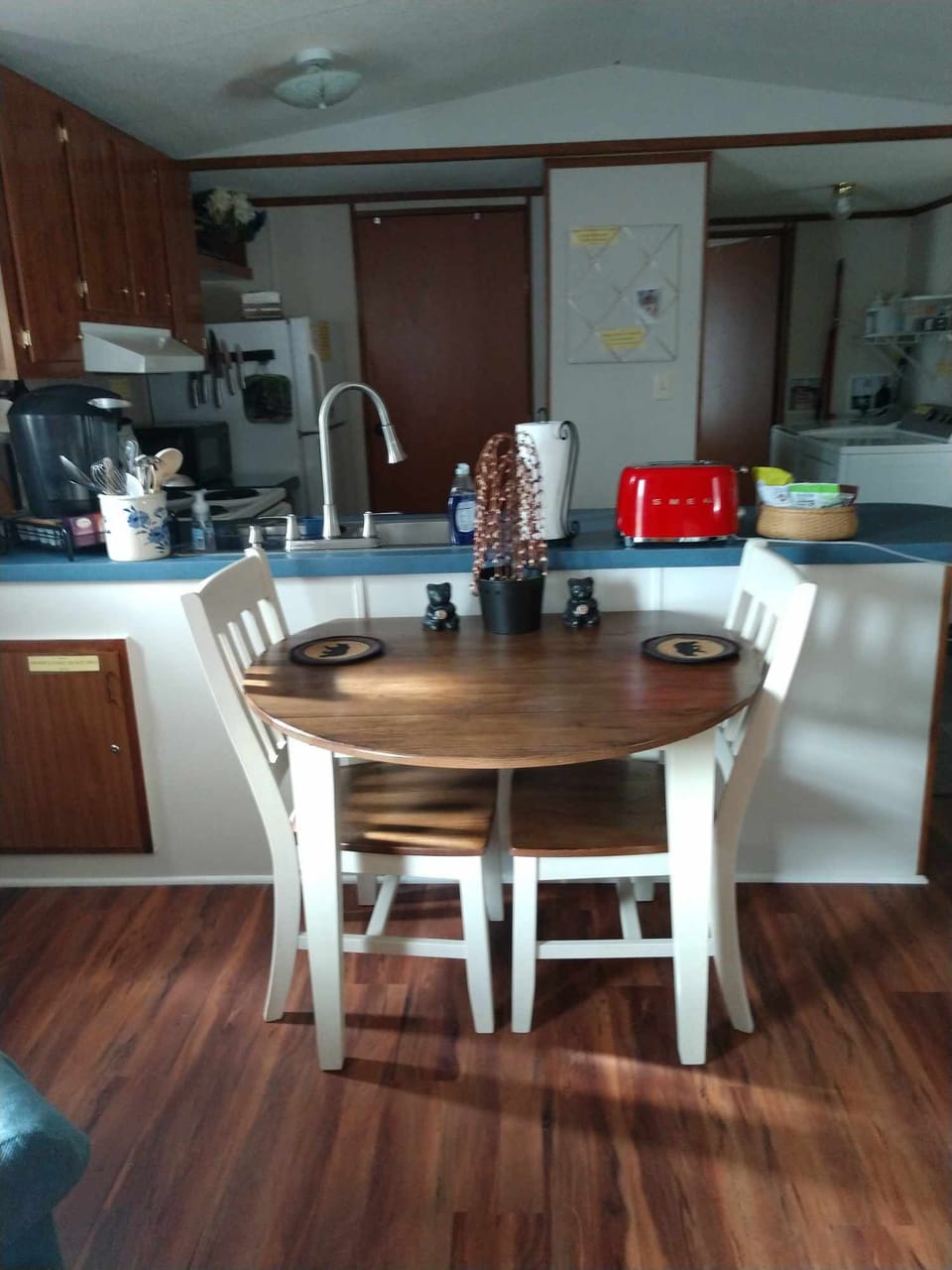 Dining table, roomy for 2. Additional table and chairs in closet of bedroom
