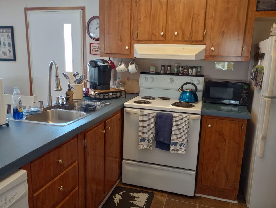 Fridge, stove, microwave, dishwasher, toaster, and Keurig included. 