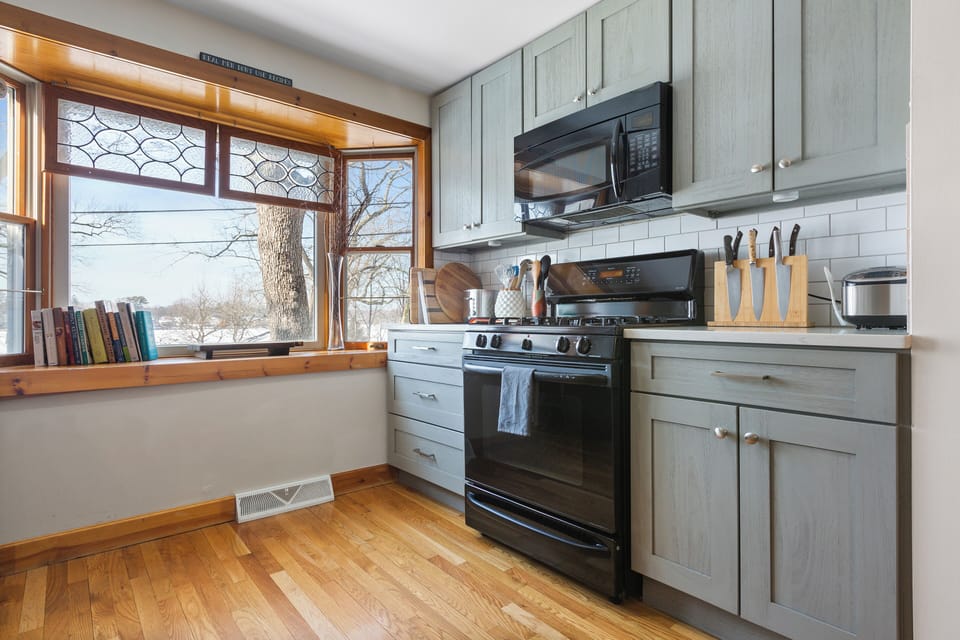 Cooking with character.  The bay window adds a unique touch to this cozy Kitchen