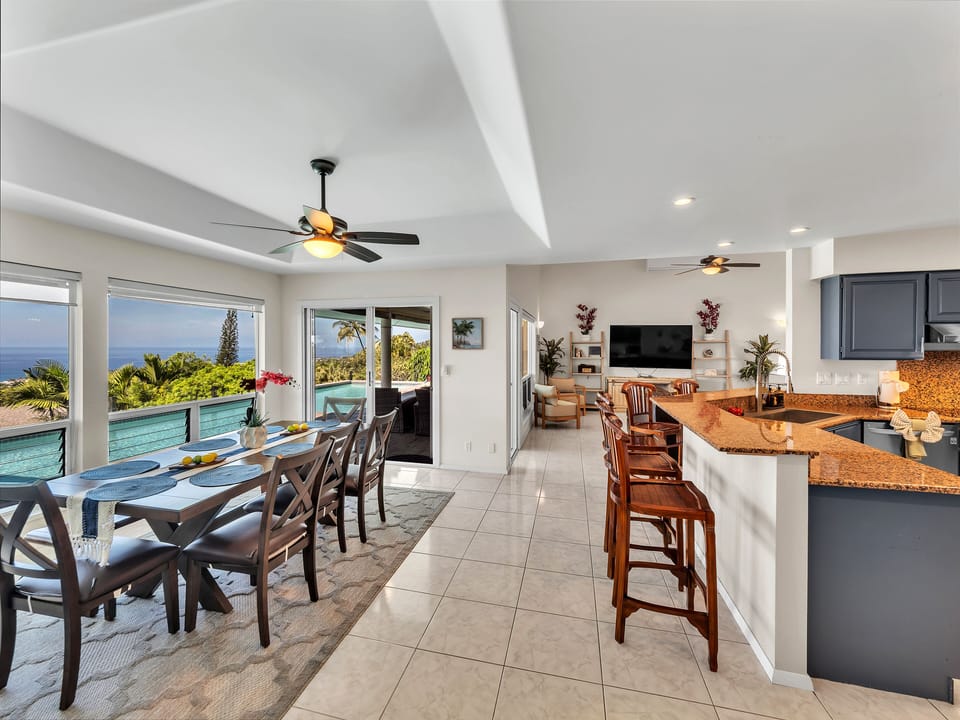 Dinning area is offering serene view of the pool & ocean