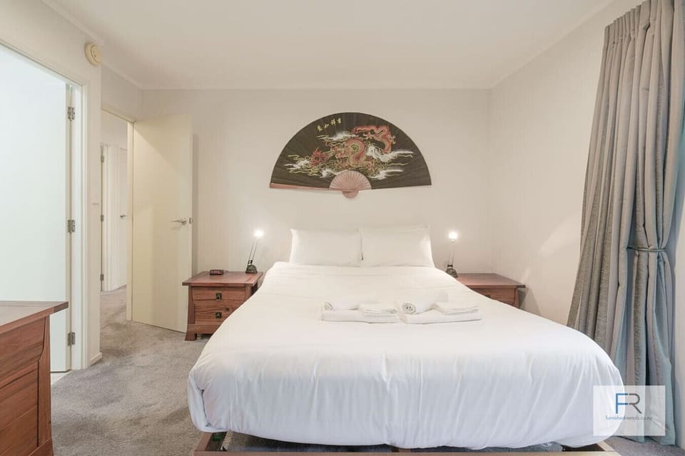 Master bedroom with queen bed and ensuite
