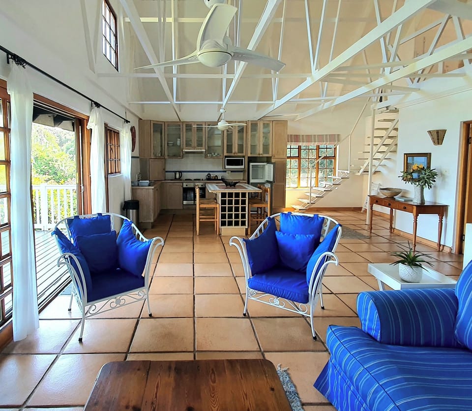 Lounge with kitchen in the background 