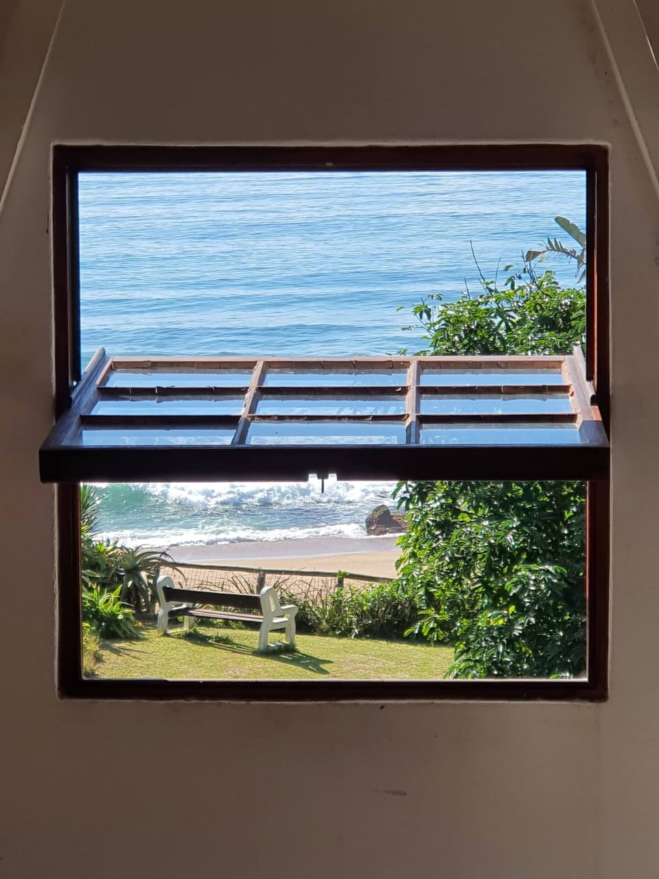 View from the 2nd bedroom through a high window 