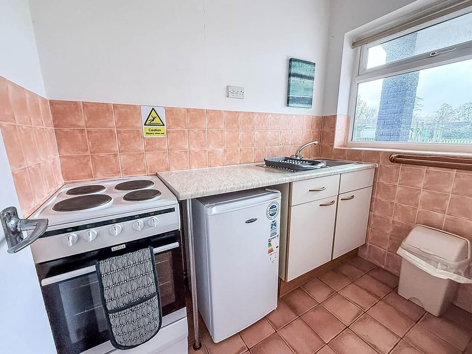 Enjoy a holiday home kitchen perfect for family meals on your next family holiday.