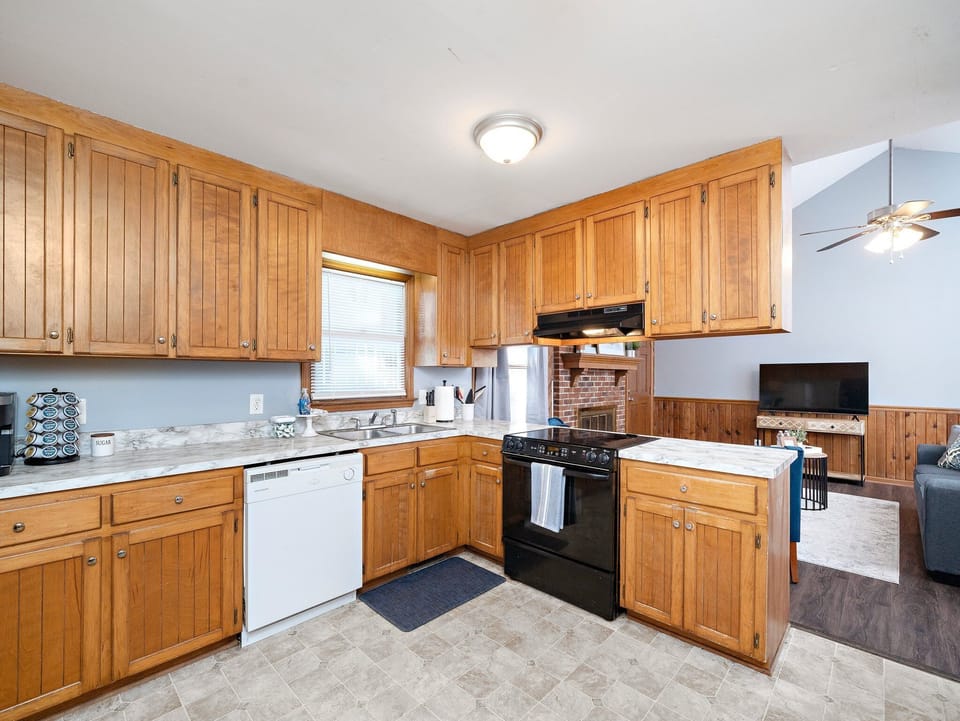 Additional view of the kitchen.