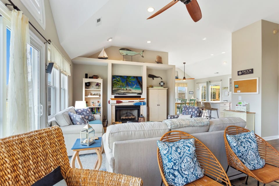 Relax in the spacious Living Area with a large, flat-screen TV.