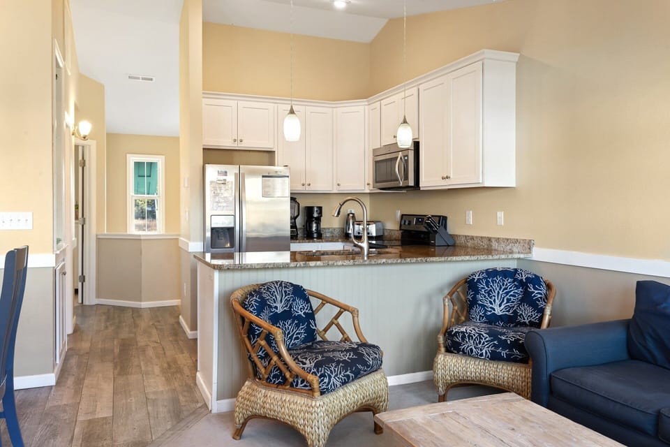 Spend your evenings relaxing in the open Living Area which flows seamlessly into the Dining and Kitchen spaces, creating a cozy environment for relaxation.