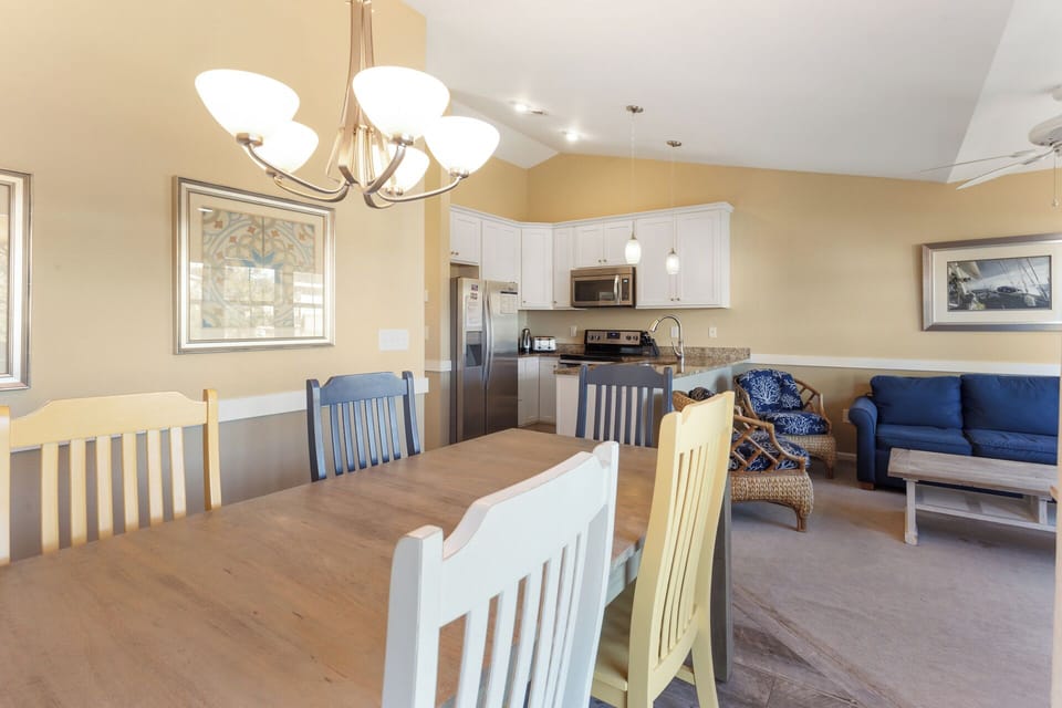 The adjacent Dining Area is perfect for soaking up the evening light as you eat a meal together.