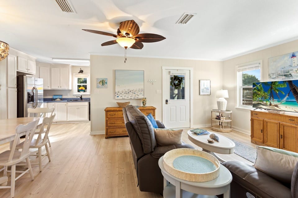On the Main Level, you'll find a thoughtfully designed layout perfect for unwinding after a day of sun and surf.